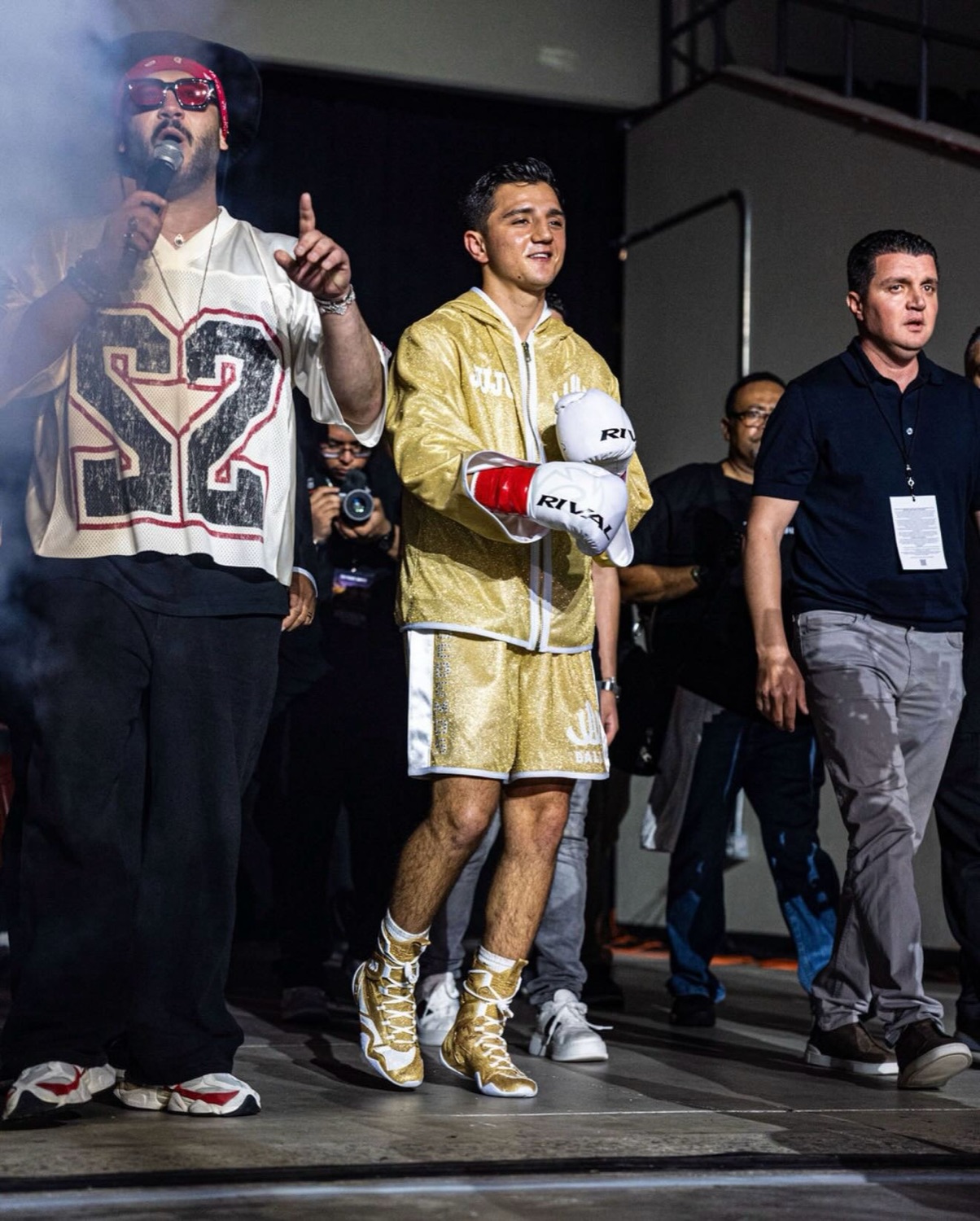 Julius Ballo in the gold robe on the walk to the ring